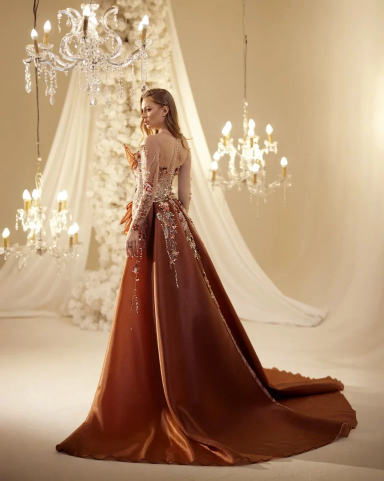 Model wearing a copper evening gown back.