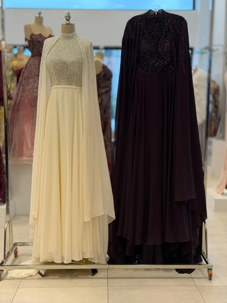 Cream and purple dresses rack.