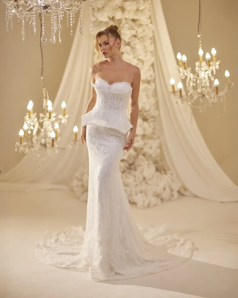 Model wearing a ivory bridal gown front.