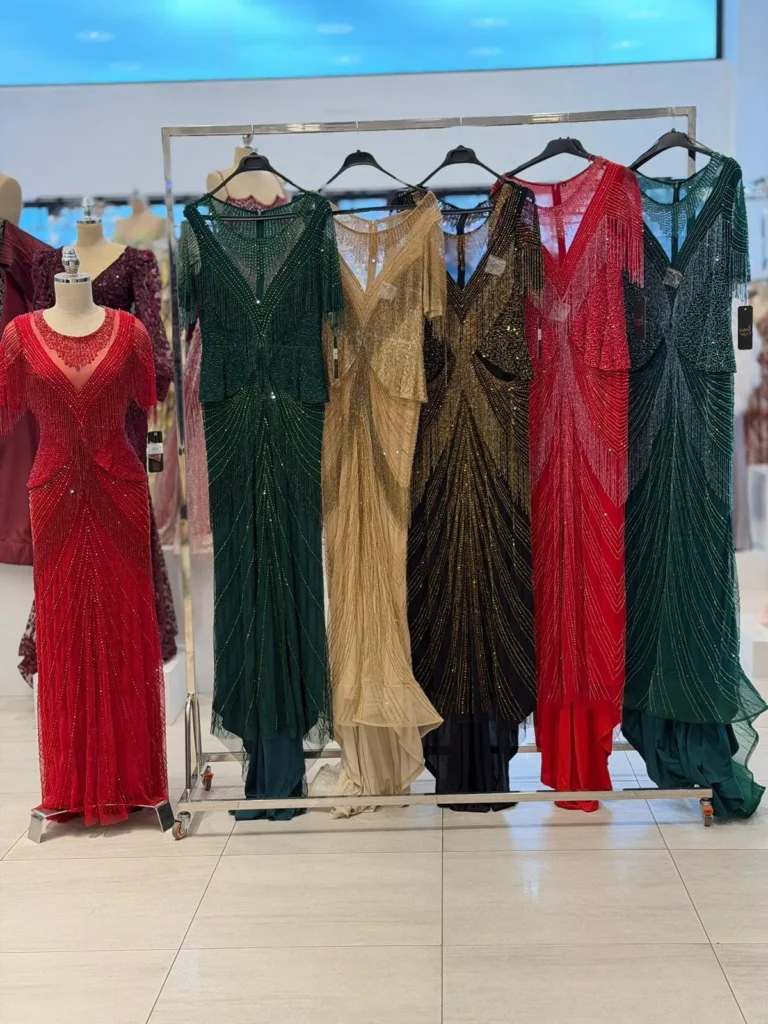 Multicolor evening dresses display.