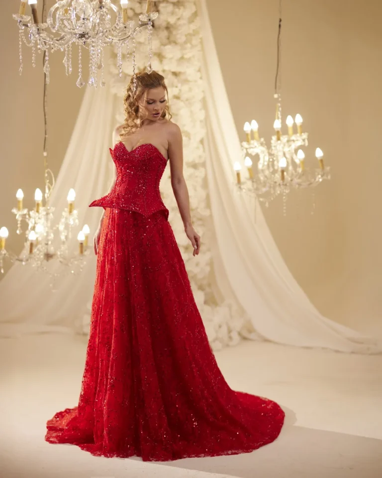 Model wearing a red evening gown back.