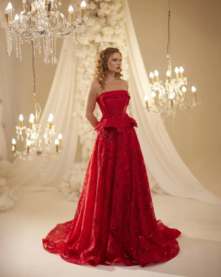 Model wearing a red evening gown front.